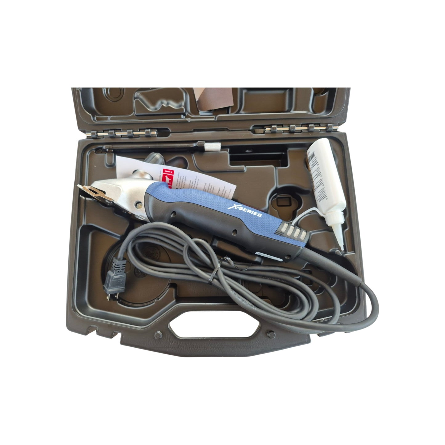 Heiniger Xperience Professional Corded Horse & Cattle Clipper complete kit with blade set, carrying case, oil, cleaning brush, screwdriver, and instruction manual.